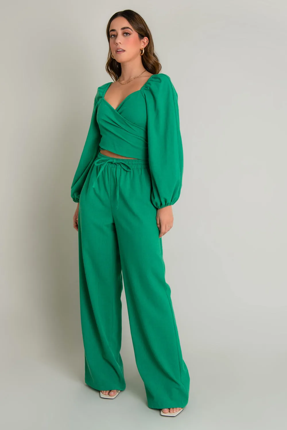 Blusa cruzada de lino con nudo espalda