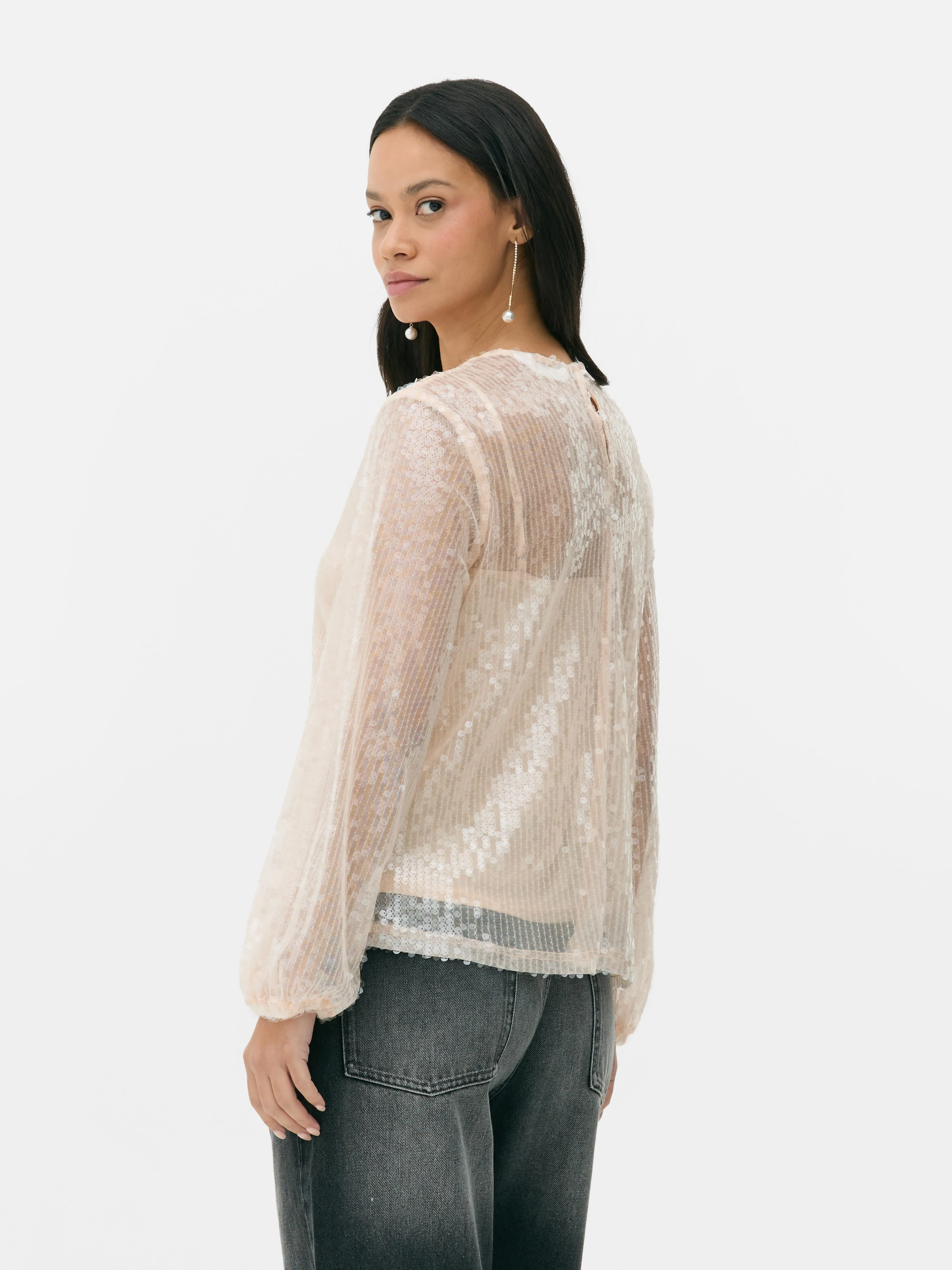 Blusa de lentejuelas con mangas globo
