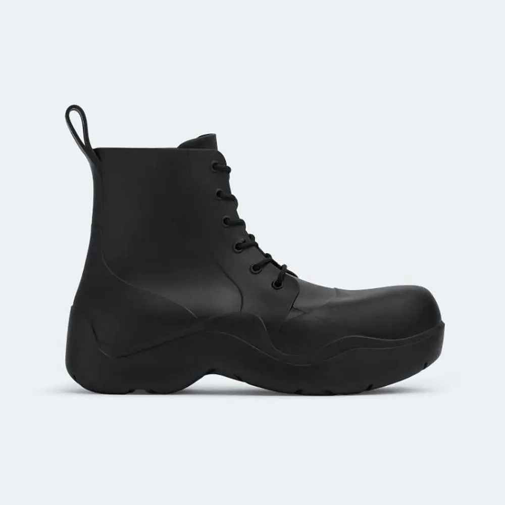 BOTTEGA VENETA BOTíN UNISEX CON CORDONES PUDDLENEGRO