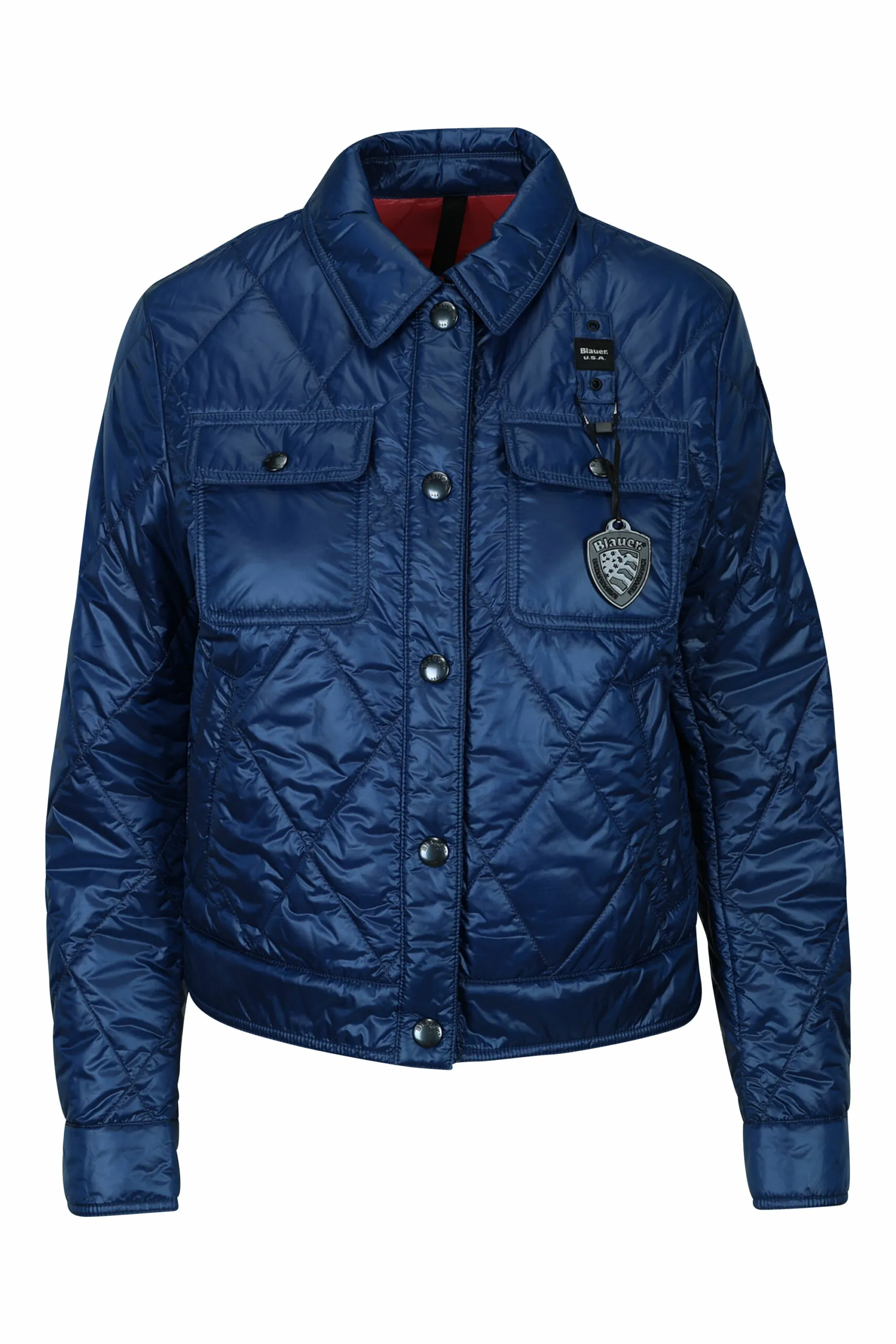 Chaqueta azul con lineas onduladas y logo parche lateral