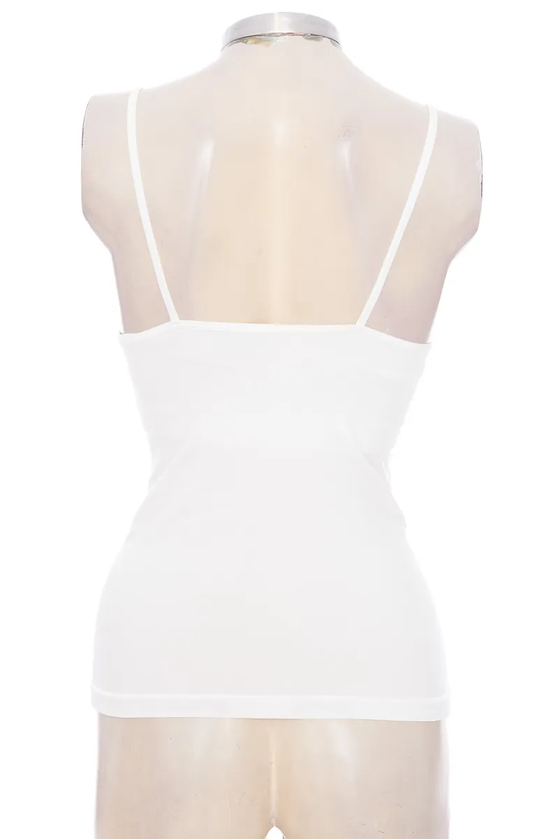 TOP / CAMISETA COLOR BLANCO  PUNTO BLANCO